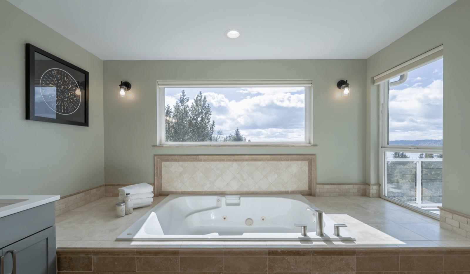 West Seattle accessible primary bathroom remodel with double vanity, jetted tub, natural light, and safety-focused design features.